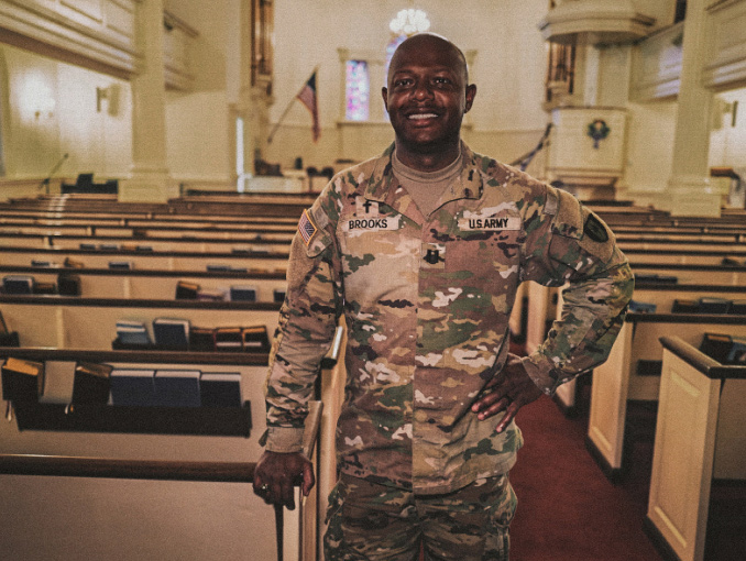 An Army Chaplain standing in a house of worship