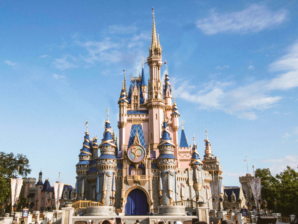 Disneyland's Sleeping Beauty castle on a mostly sunny day