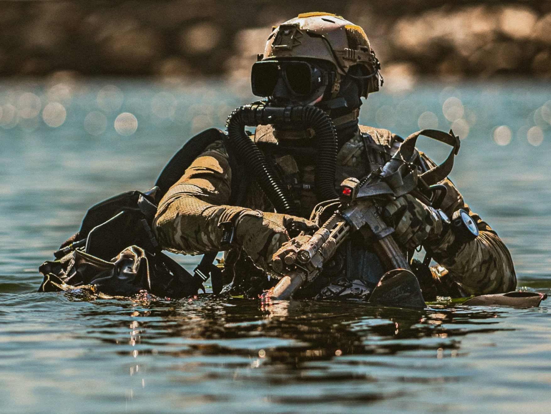 A Green Beret emerges from a closed-circuit dive