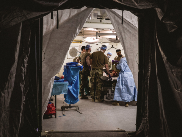Army medical team performing a surgery